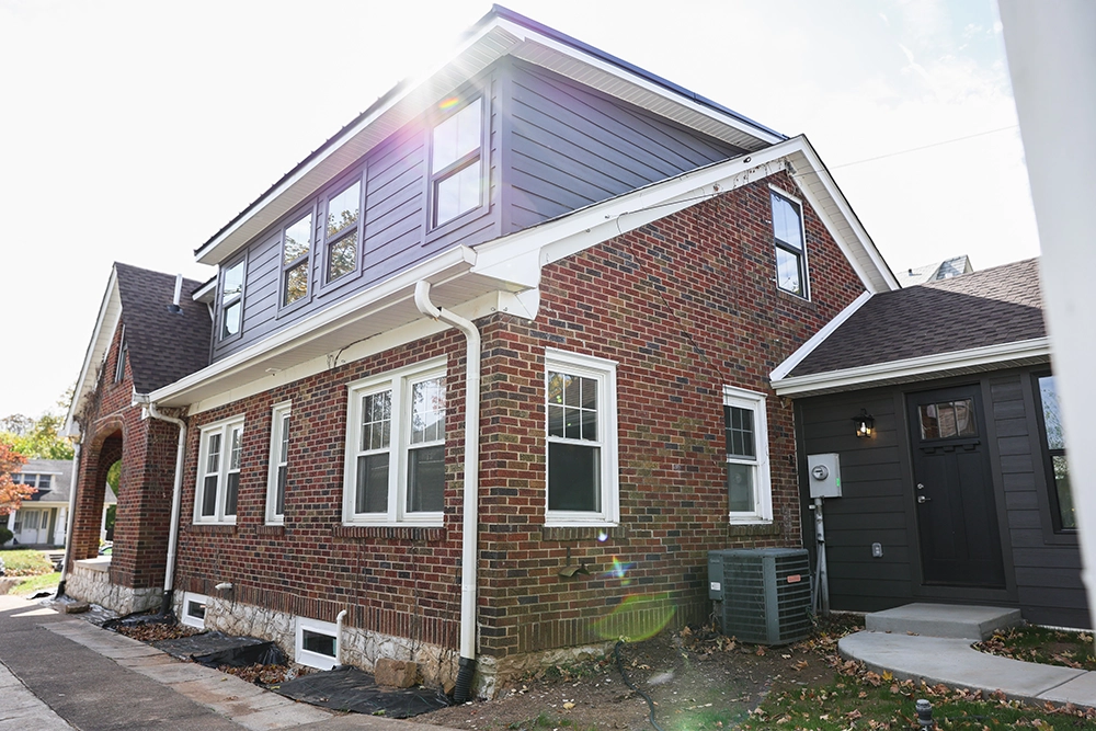 beautiful house with brick and new addition