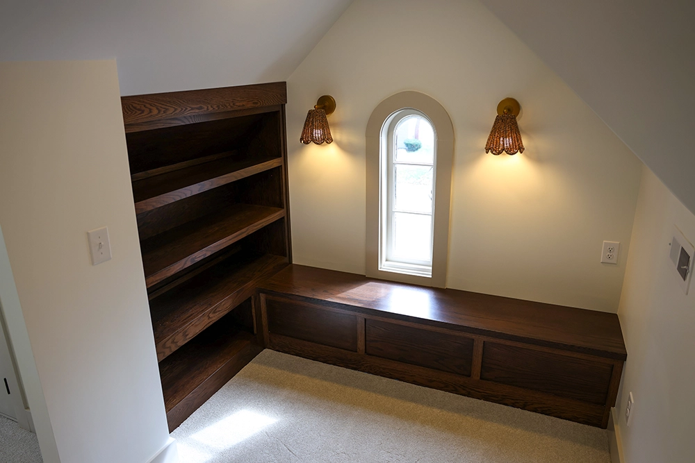 newly constructed nook with bookcase and bench